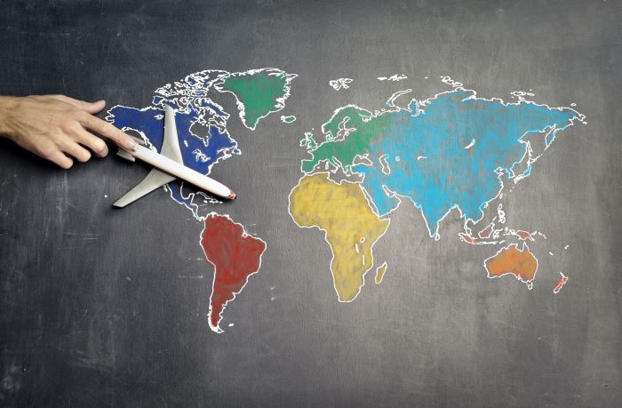 World map with travel destinations marked